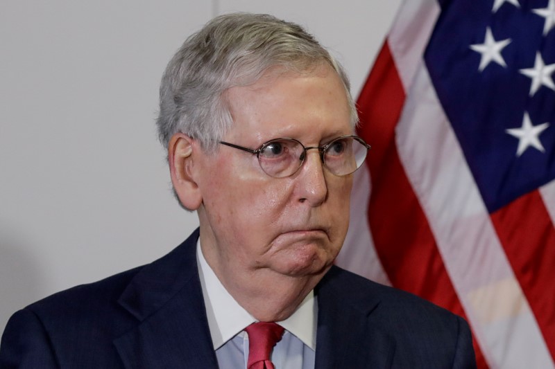 U.S. Senate Majority Leader Mitch McConnell speaks to reporters about