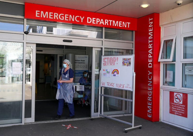 A triage nurse waits for patients in the Emergency Department