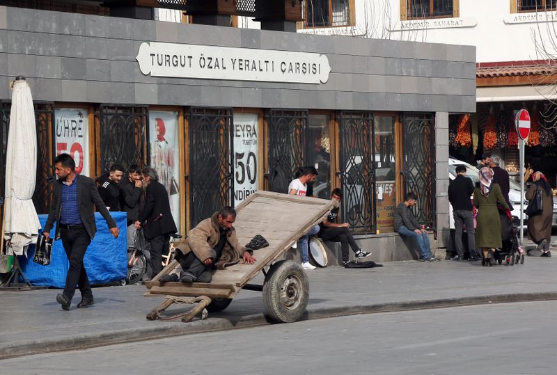 A porter wiats for customers in Diyarbakir