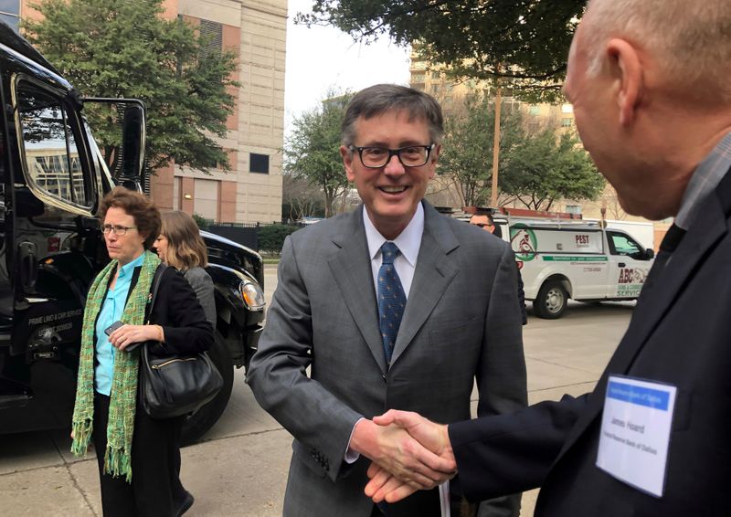 FILE PHOTO: Federal Reserve Vice Chairman Clarida greets a member