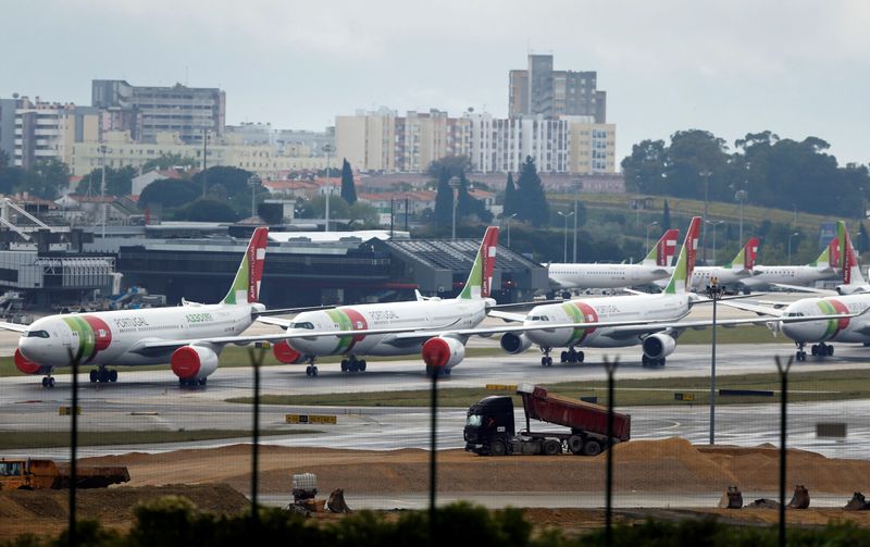 TAP planes are seen at Lisbon’s airport  during partial