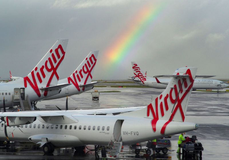 A rainbow from a passing rain shower sits over Virgin