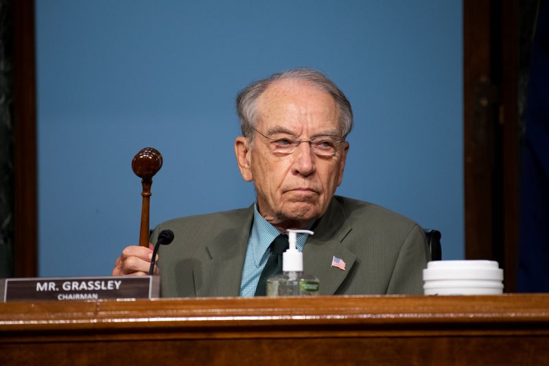Chairman Chuck Grassley, (R-IA), holds up a gavel during a