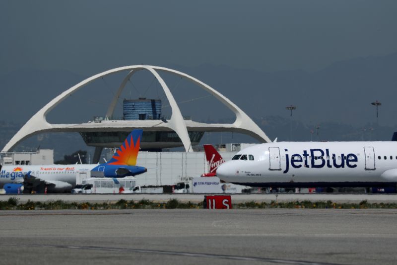 A Jet Blue airplane is seen at Los Angeles International