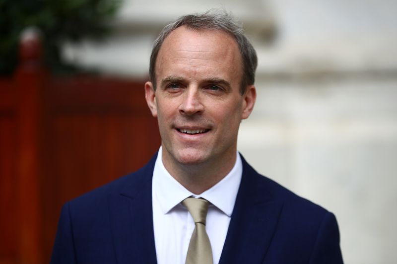 FILE PHOTO: Britain’s Foreign Secretary Dominic Raab reacts as he