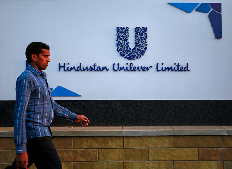 A pedestrian walks past the Hindustan Unilever Limited (HUL) headquarters