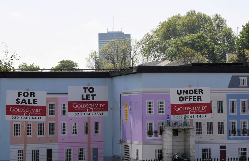 FILE PHOTO: An estate agent property advertisment is seen painted