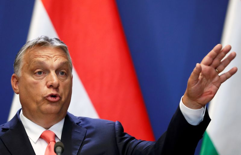 FILE PHOTO: Hungary’s PM Orban and Slovakia’s PM Matovic hold