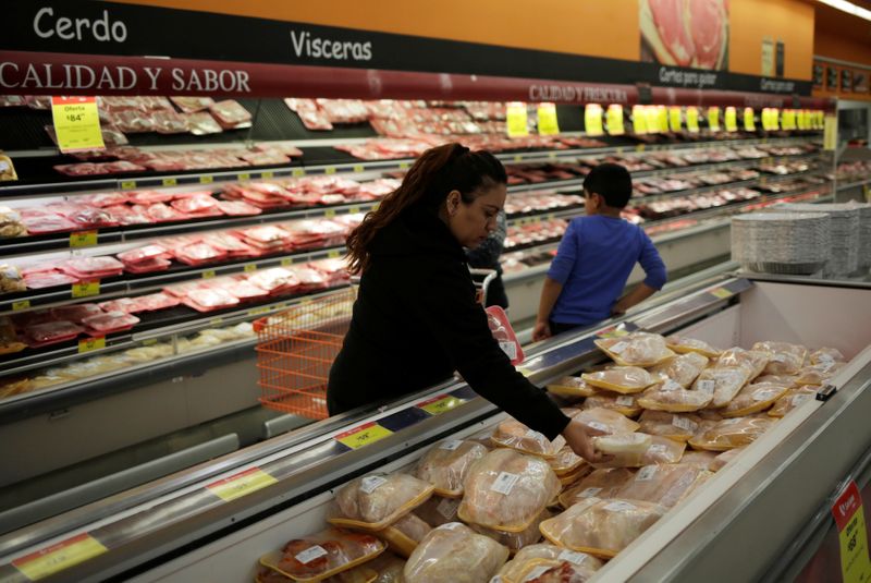 A woman selects food at a supermarket in Ciudad Juarez,