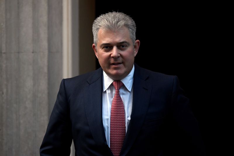 Britain’s Secretary of State for Northern Ireland Brandon Lewis leaves