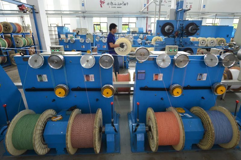 FILE PHOTO: Employee works at a factory of the Zhejiang