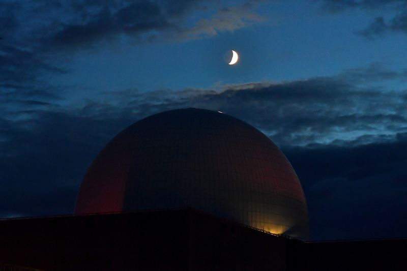 FILE PHOTO: The moon is seen above Sizewell Nuclear Power