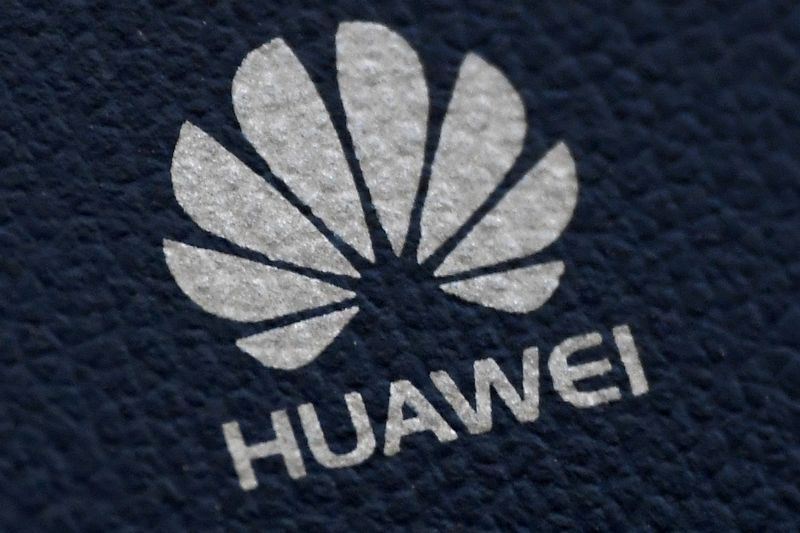 FILE PHOTO: The Huawei logo is seen on a communications