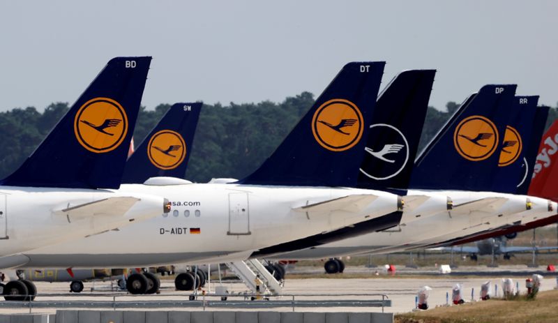 FILE PHOTO: Airplanes of German carrier Lufthansa are parked at