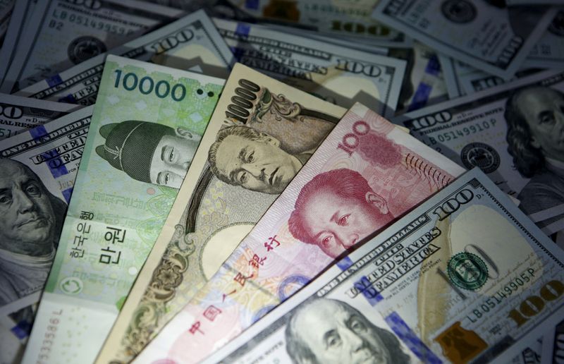 FILE PHOTO: South Korean won, Chinese yuan and Japanese yen