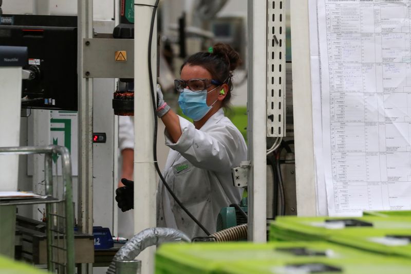 An employee works at a factory of manufacturer Valeo, in
