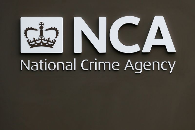 A sign is seen outside the National Crime Agency headquarters