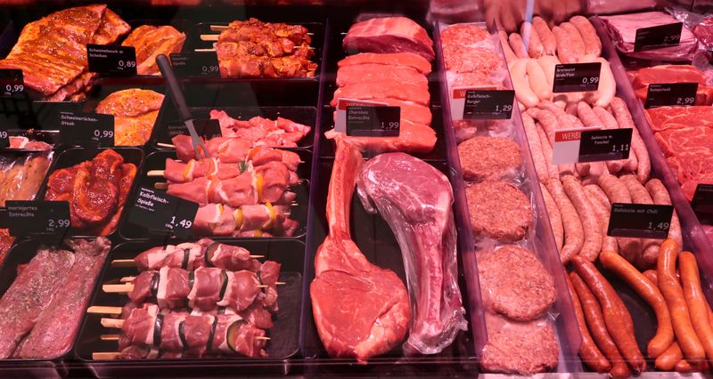 Meat products are displayed in a supermarket in Berlin