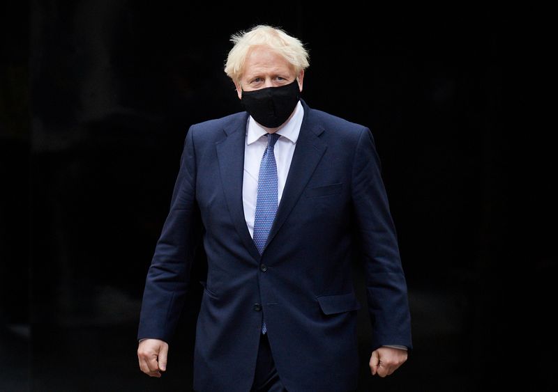 Britain’s PM Boris Johnson visits Octopus Energy, in London