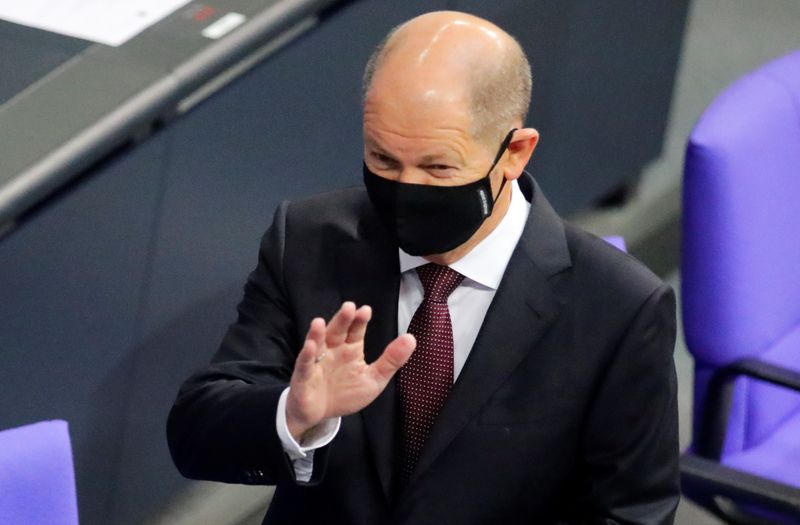 FILE PHOTO: German Finance Minister Olaf Scholz attends a session