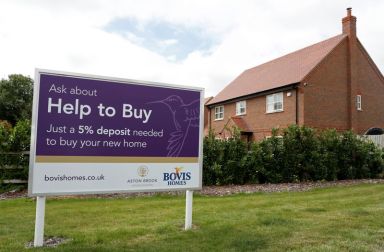 A “help to buy” sign is pictured next to new