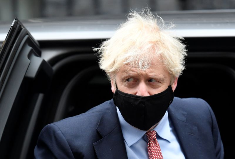 Britain’s Prime Minister Boris Johnson returns to Downing Street