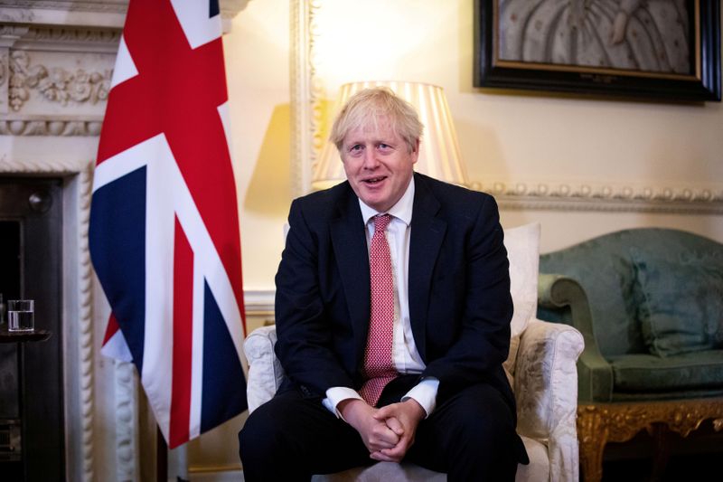 FILE PHOTO: Britain’s PM Johnson meets Ukraine’s President Zelenskiy in