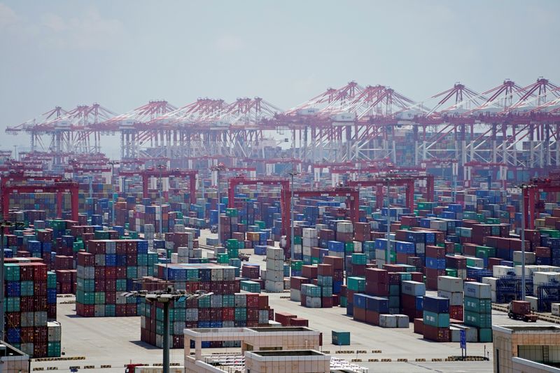 Containers are seen at the Yangshan Deep Water Port in