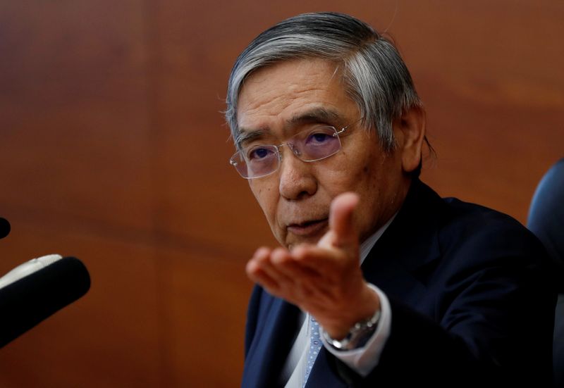 Bank of Japan (BOJ) Governor Haruhiko Kuroda attends a news