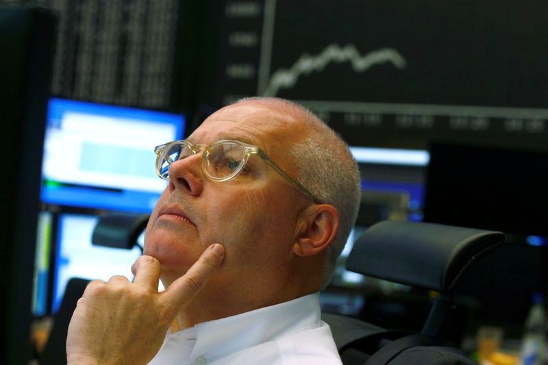 A traders reacts at stock exchange in Frankfurt