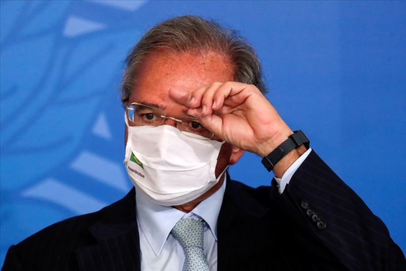 Brazil’s Economy Minister Paulo Guedes gestures during the launching ceremony
