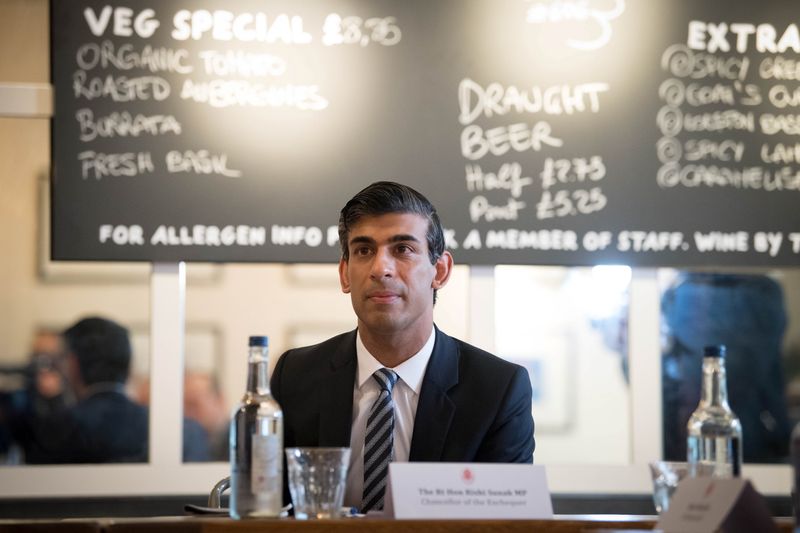 Britain’s Chancellor of the Exchequer Rishi Sunak delivers an economic