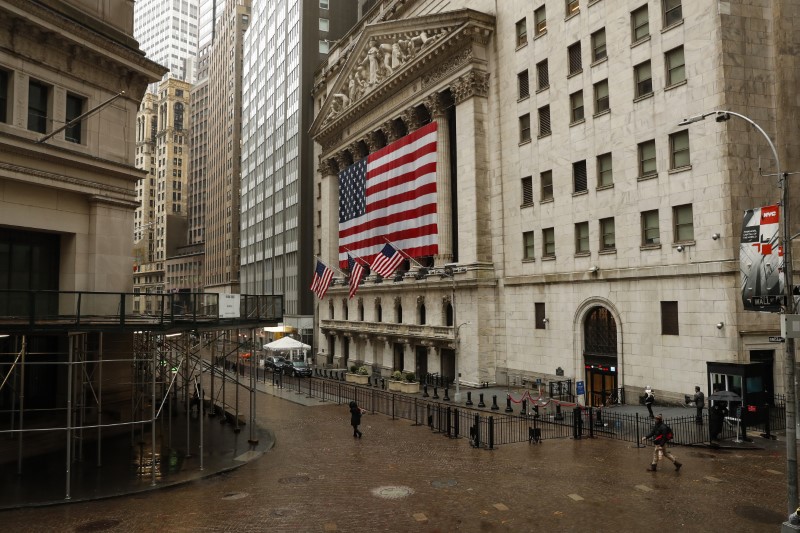 United States flags fly outside of the NYSE as markets