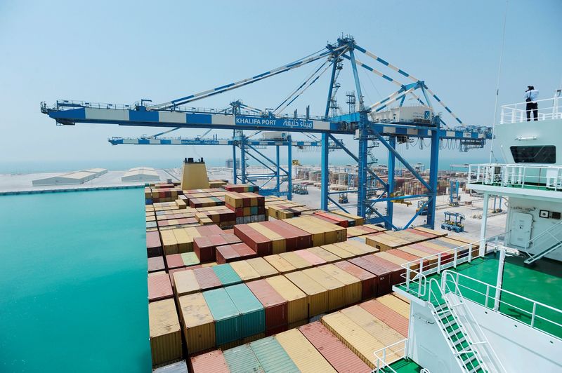 FILE PHOTO: Containers are stacked under cranes at a container