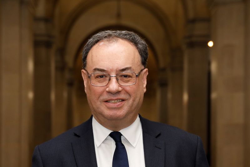 FILE PHOTO: Bank of England Governor Andrew Bailey poses for