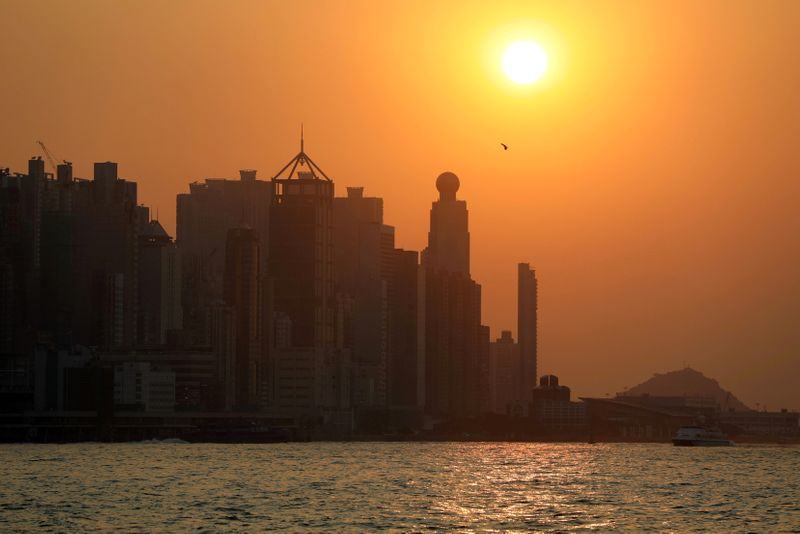 FILE PHOTO: Harbour skyline is seen during sunset in Hong
