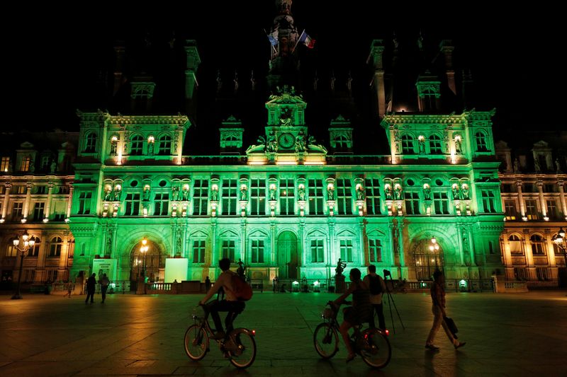 FILE PHOTO: Green lights are projected onto the facade of