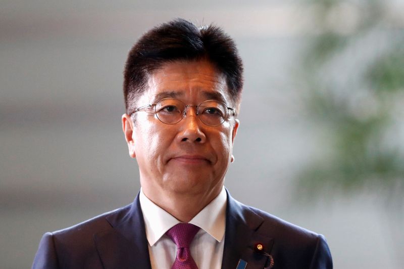 Japan’s new Health, Labour and Welfare Minister Katsunobu Kato arrives