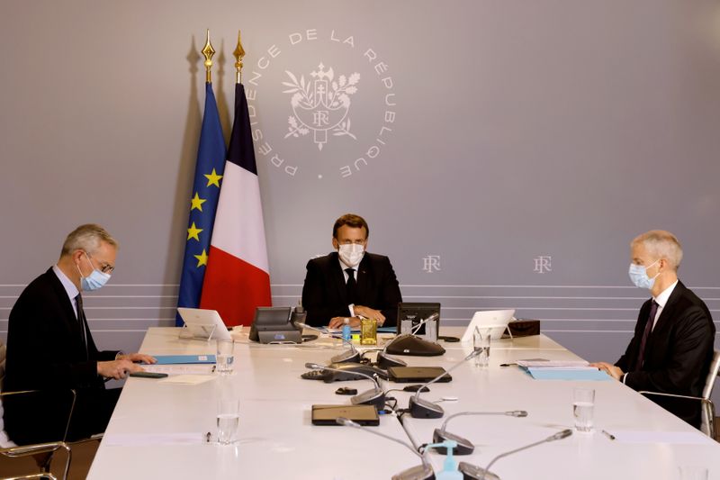 French President Emmanuel Macron chairs a video conference with foreign