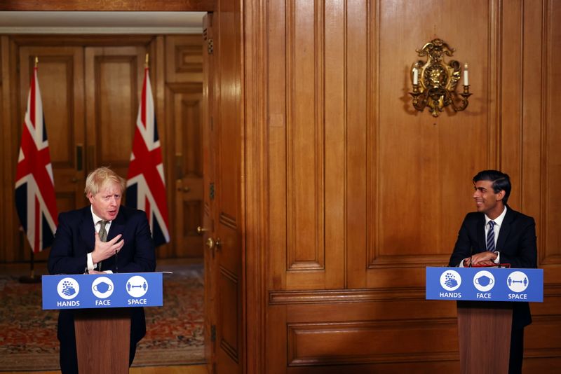 FILE PHOTO: Britain’s PM Johnson attends a news conference in