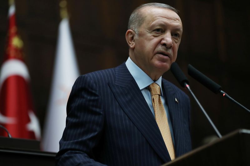 FILE PHOTO: Turkish President Erdogan addresses members of his ruling