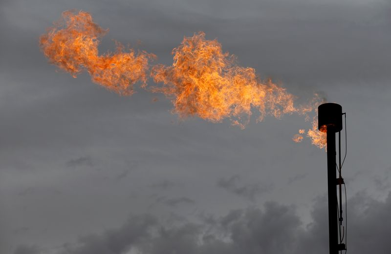 FILE PHOTO: A flare burns off excess gas from a