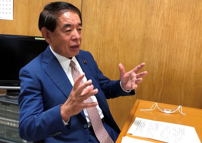 Hakubun Shimomura speaks during an interview with Reuters in Tokyo