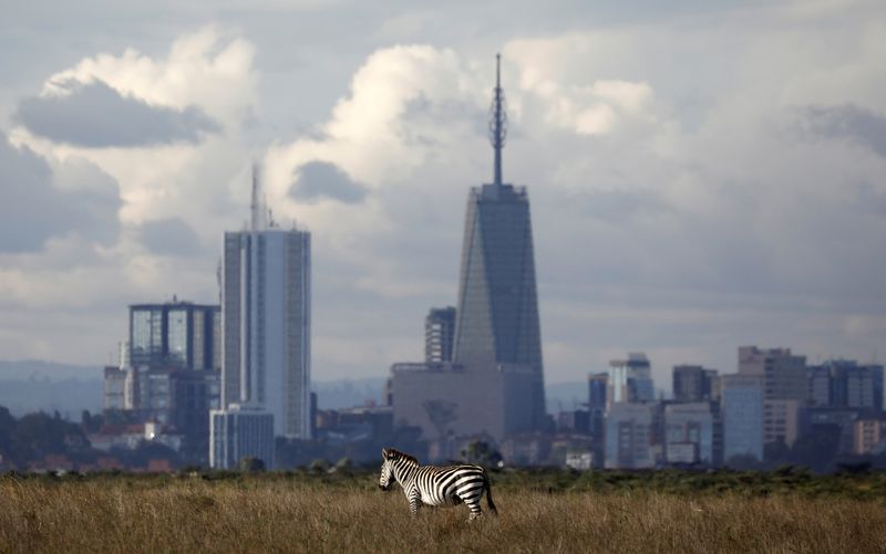 The Nairobi skyline is seen in the background as a