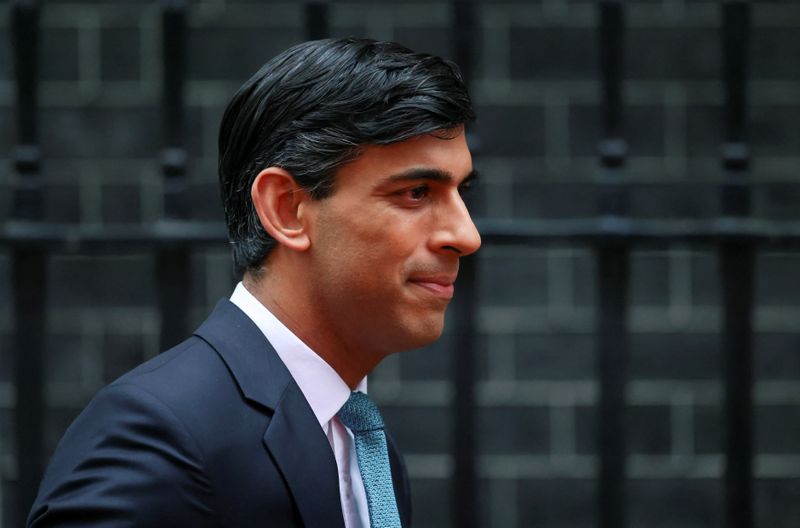 Britain’s Chancellor of the Exchequer Sunak outside Downing Street, in