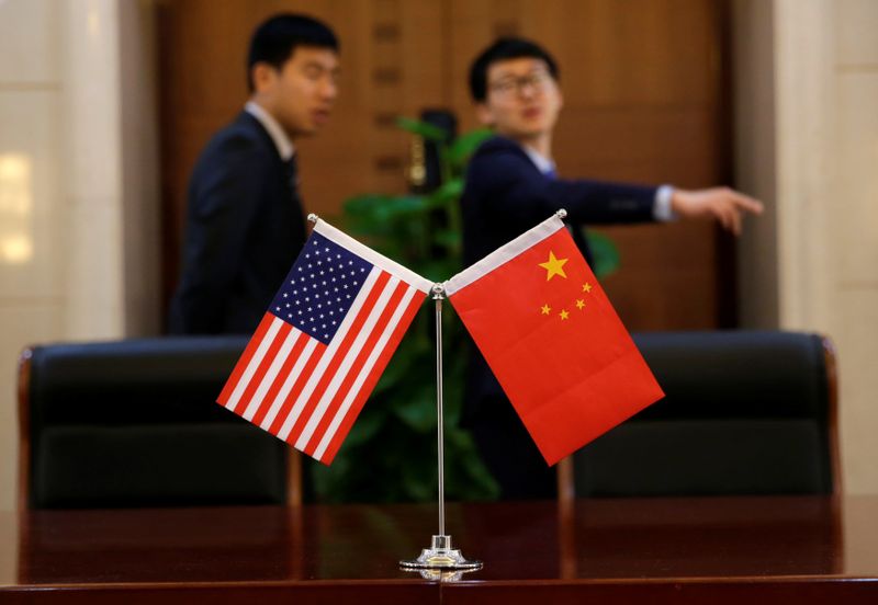 Chinese and U.S. flags are set up for a signing