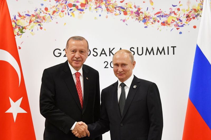 FILE PHOTO: Russian President Putin and Turkish President Erdogan attend
