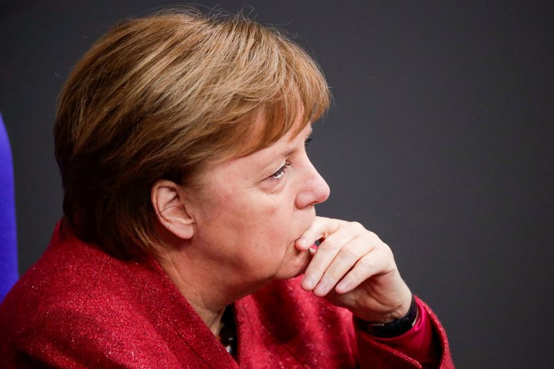 German Chancellor Angela Merkel attends a session at the lower
