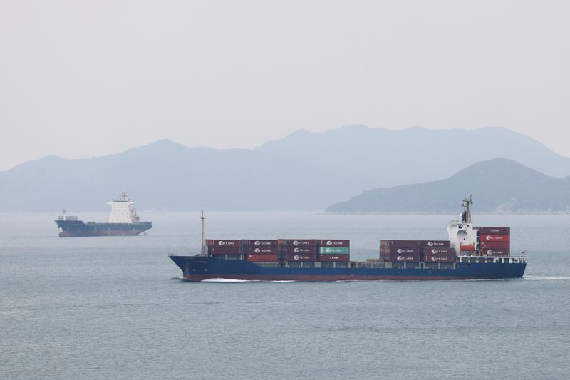 Cargo ships sail in Hong Kong