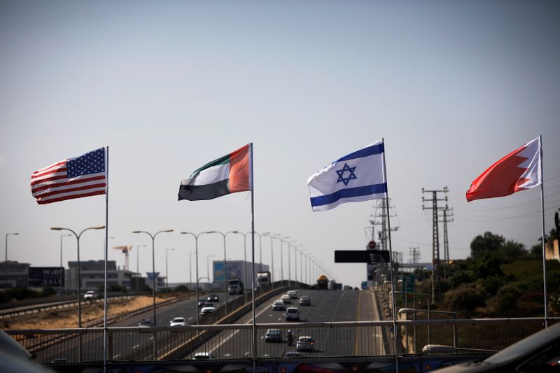 The flags of the U.S., United Arab Emirates, Israel and